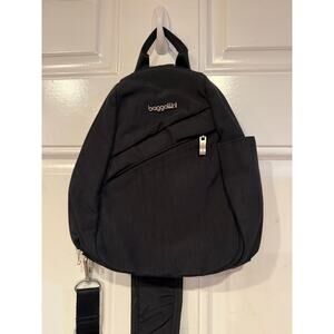 Baggallini sling bag backpack 9x11 inches.
.